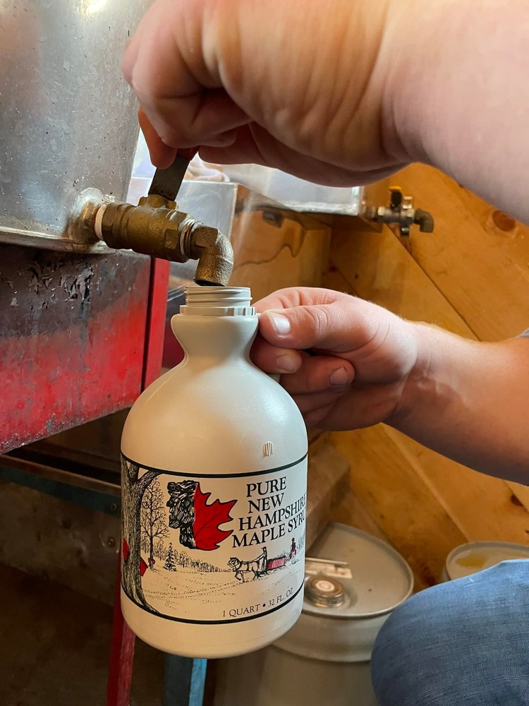 Student pouring maple syrup